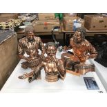 Three copper effect musical busts