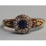 An 18ct gold diamond and sapphire ring, 3.8g, size 'P'