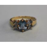 A 9ct gold five stone aquamarine ring, size 'P'