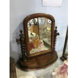 A mahogany dressing table mirror