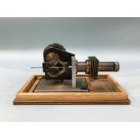 A cased model of a Rhombic Drive Stirling engine, 23cm wide