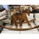 A pine rocking horse