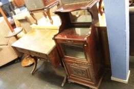 An Edwardian music cabinet and a walnut sofa table