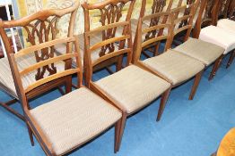 A set of four McIntosh teak ladderback single chairs