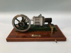 A cased model of a 'Stirling Engine', 27cm wide