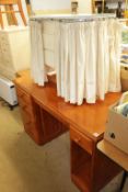 A pine desk and kidney shape dressing table