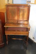 A 19th century rosewood and ornate brass inlaid ladies writing desk, the top with cupboard doors and