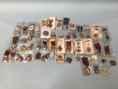 A collection of various Masonic jewels