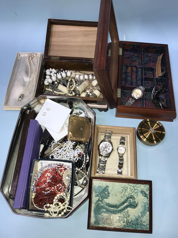 A quantity of costume jewellery and watches