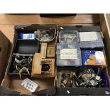 Two boxes of watch parts