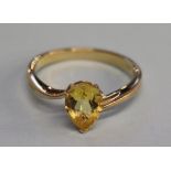 A 9ct gold pear cut and citrine ring, size 'N'