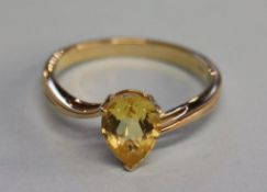 A 9ct gold pear cut and citrine ring, size 'N'