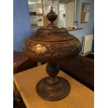 A large turned and carved wood lidded vase, 58cm height