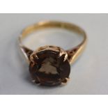 A 9ct gold smokey quartz ring, size 'K'