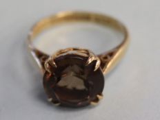 A 9ct gold smokey quartz ring, size 'K'