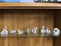 Eight Lladro and Nao animal figures