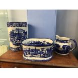 A large modern blue and white footbath, stick stand and water jug