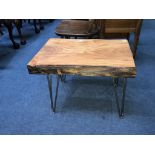 A rustic long top occasional table, with metal work base, 58cm wide