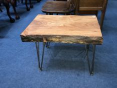A rustic long top occasional table, with metal work base, 58cm wide