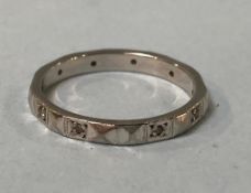 An 18ct white gold and diamond eternity ring, size 'O'