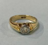 An 18ct gold diamond solitaire ring, 40 points, size 'P'