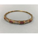 A 9ct gold bracelet, mounted with rubies and diamonds, 10g