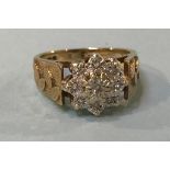 A 9ct gold diamond cluster ring, size 'N'