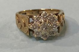 A 9ct gold diamond cluster ring, size 'N'