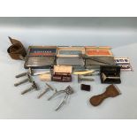 A collection of Rolls razors