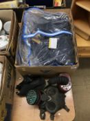 A box containing an RAF flight sergeant uniform and two gas masks