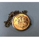 A sovereign, dated 1966, with a 9ct gold mount and chain, 14.5g