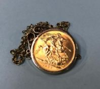 A sovereign, dated 1966, with a 9ct gold mount and chain, 14.5g