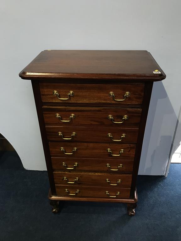 A narrow mahogany chest of drawers, with four long drawers, 68cm wide