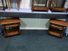 A pair of oak bedside tables, with single drawers, 62cm wide