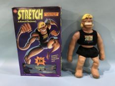 A boxed 'Stretch Armstrong' toy