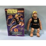 A boxed 'Stretch Armstrong' toy