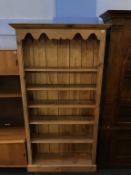 A tall pine open bookcase, 112cm wide