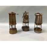 Three miners lamps