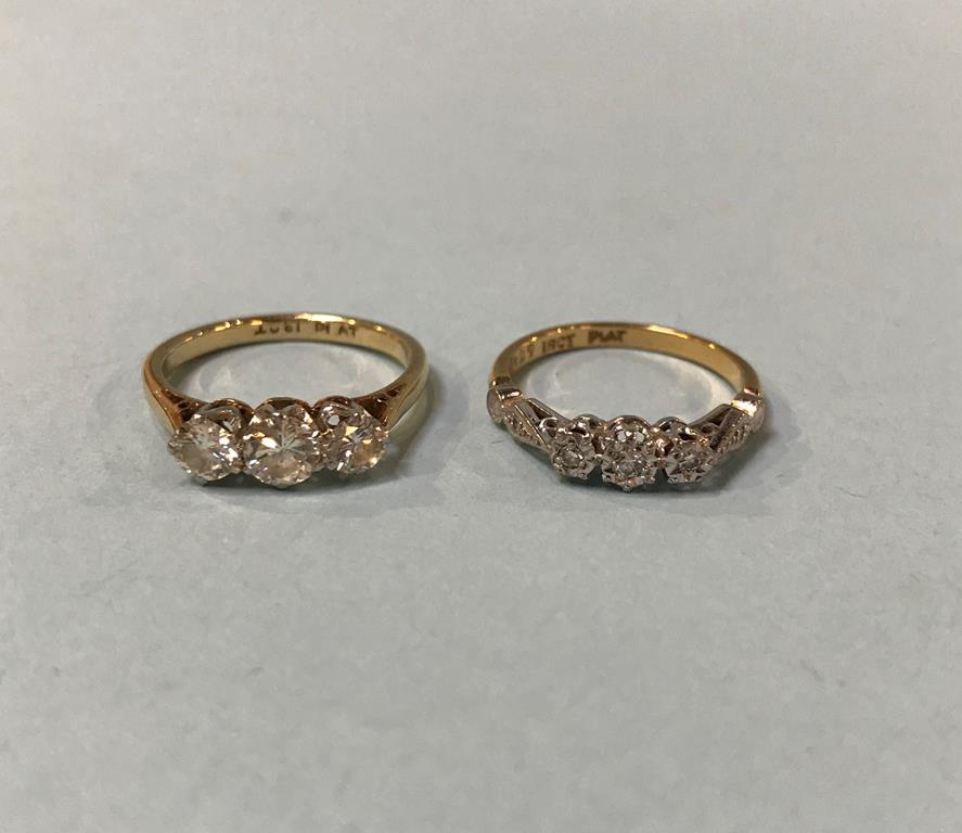Two 18ct gold rings, 5.8g, size M/N