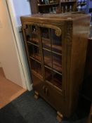 An oak glazed bookcase, 90cm wide