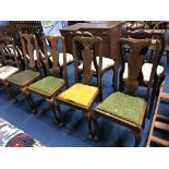 Four Queen Anne style walnut chairs