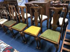 Four Queen Anne style walnut chairs