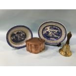 A blue and white latticework dish and stand, a hand bell and a copper box