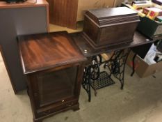 A hifi cabinet and Singer Treddle sewing machine