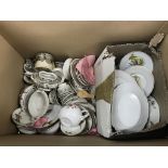 A box of various dolls house china