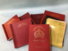 A box of six various stamp albums