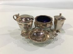 Assorted silver, tea strainer and pepper pot etc.
