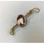 An 18ct gold brooch, mounted with a horse's head cameo, 5.8g