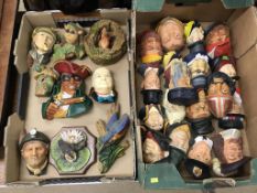 Two boxes of Bosson and Legends wall masks