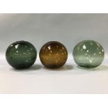 Three glass witches balls